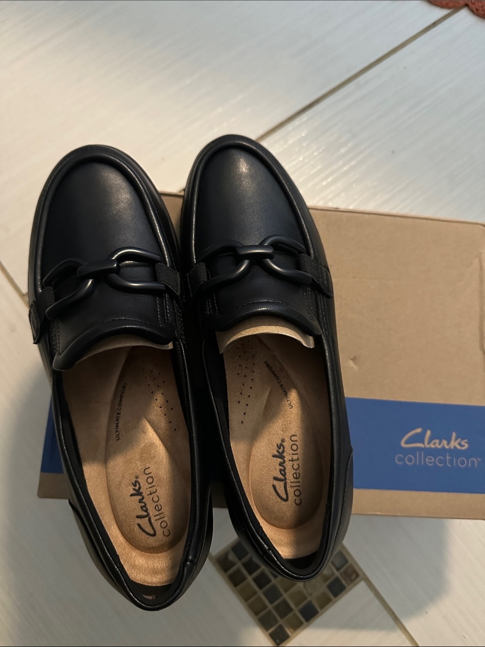 Clarks Black Leather Slip-On Loafers with Chain Detail